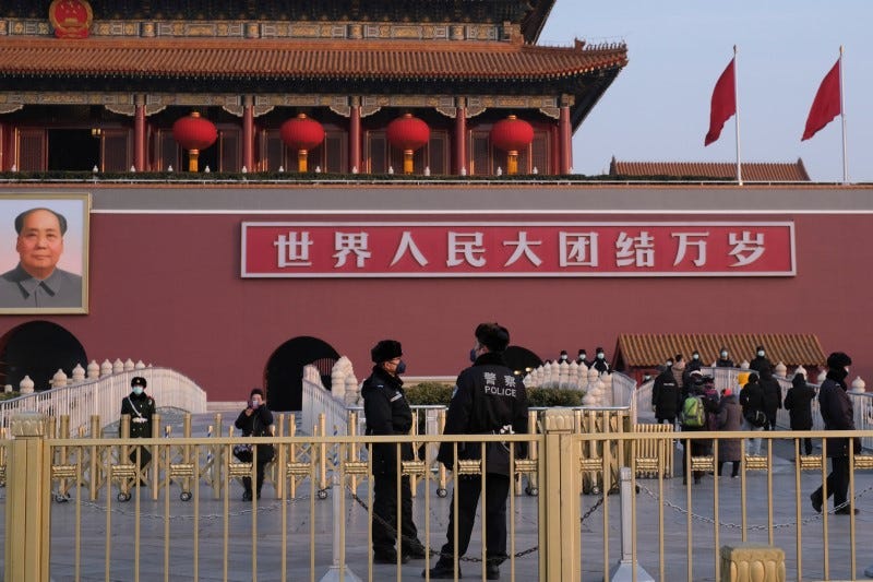 Masked police outside the Forbidden City during Lunar New Year 2020